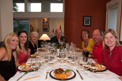 Wine tasting dinner guests at the table